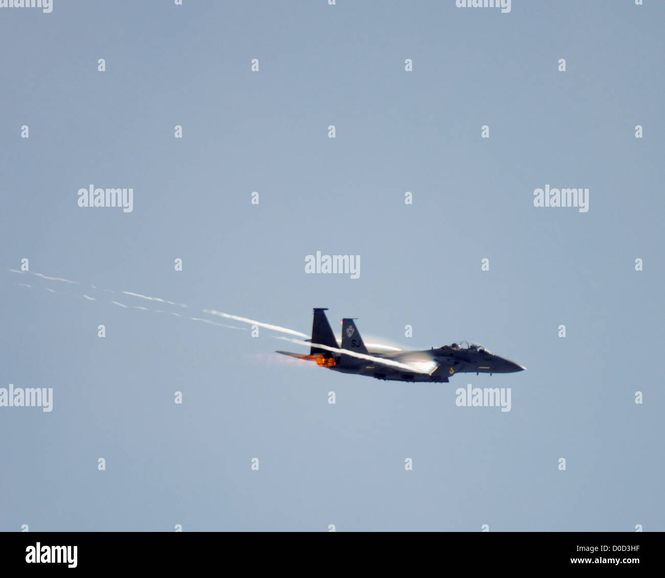 A US Air Force F15E Strike Eagle Makes a High G Turn, Sending