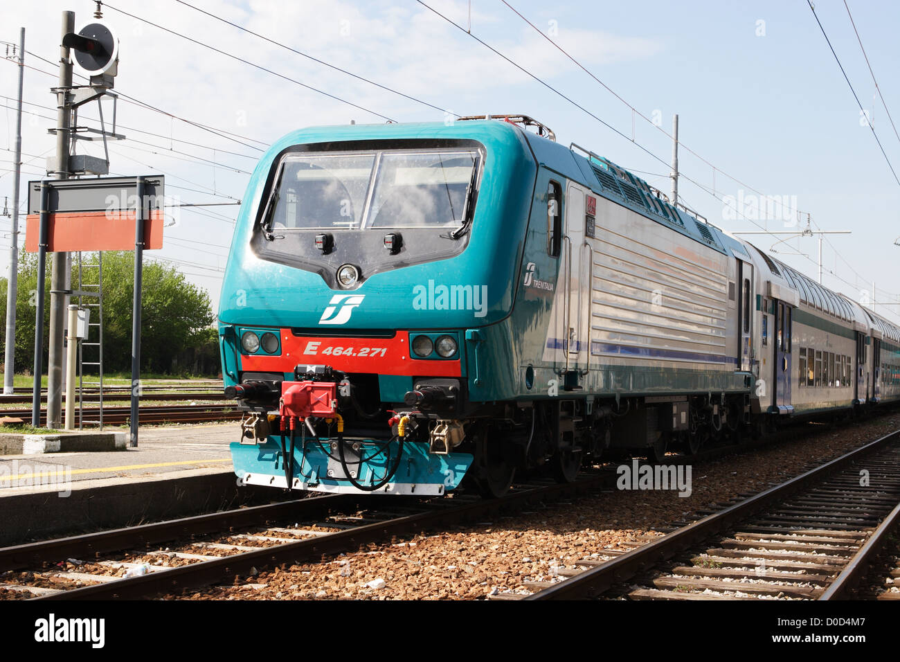 Trenitalia electric railway locomotive and train arriving at Bergamo rail station  Lombardy Italy Stock Photo