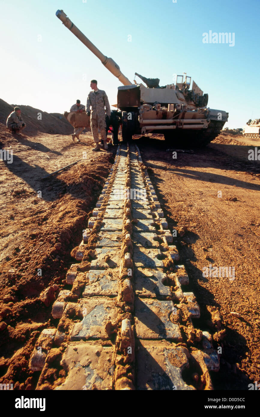 US Marines Fix a Damaged Link on a Track of an M1A1 Abrams Tank at