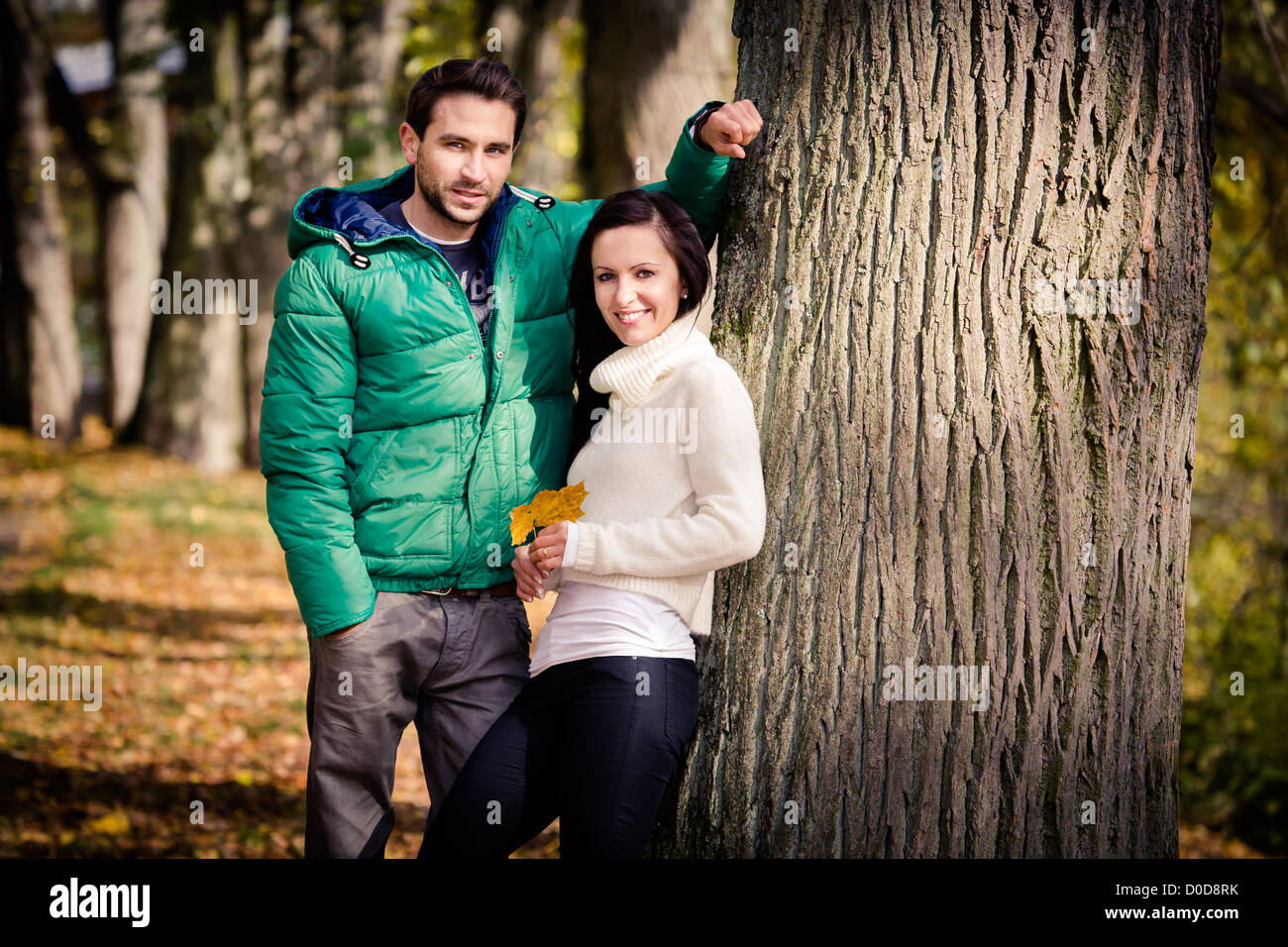 a young couple in the autumn park Stock Photo - Alamy