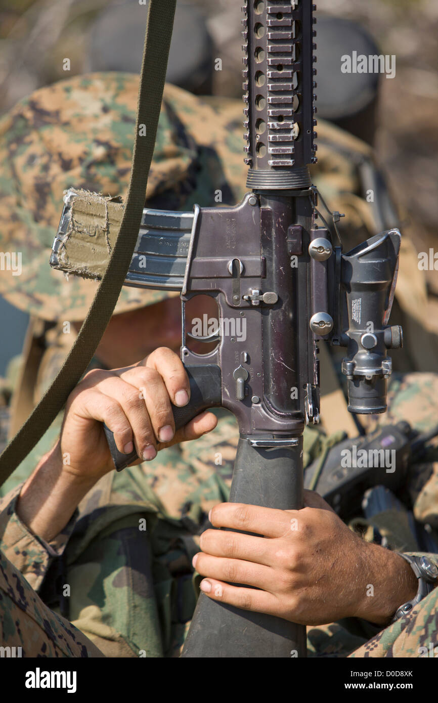 U.S. Marine Holding His M16 Service Rifle Stock Photo