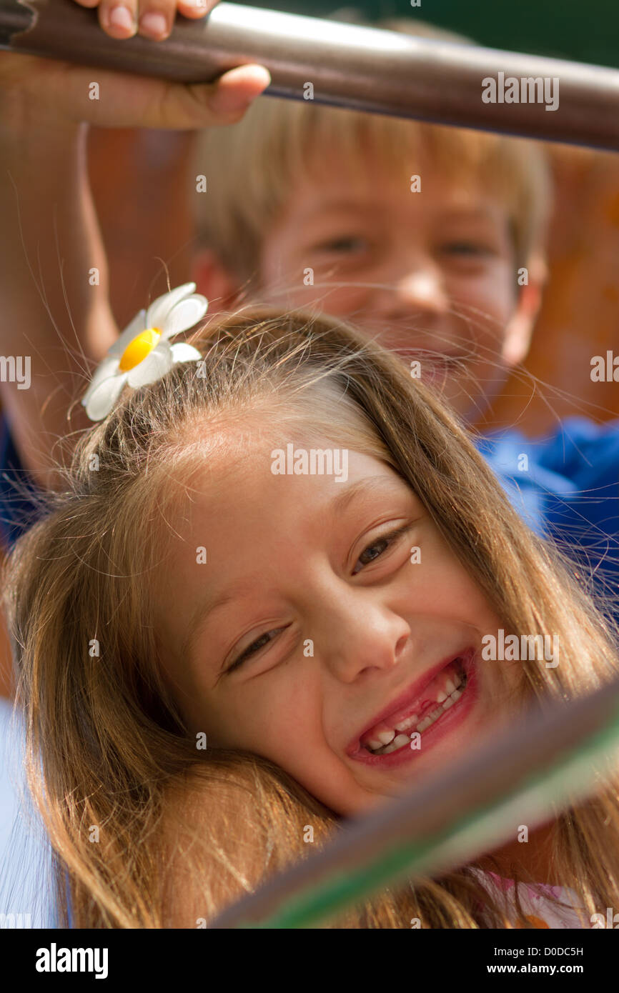 Cute little kids posing on the playgorund at bright summer day Stock ...