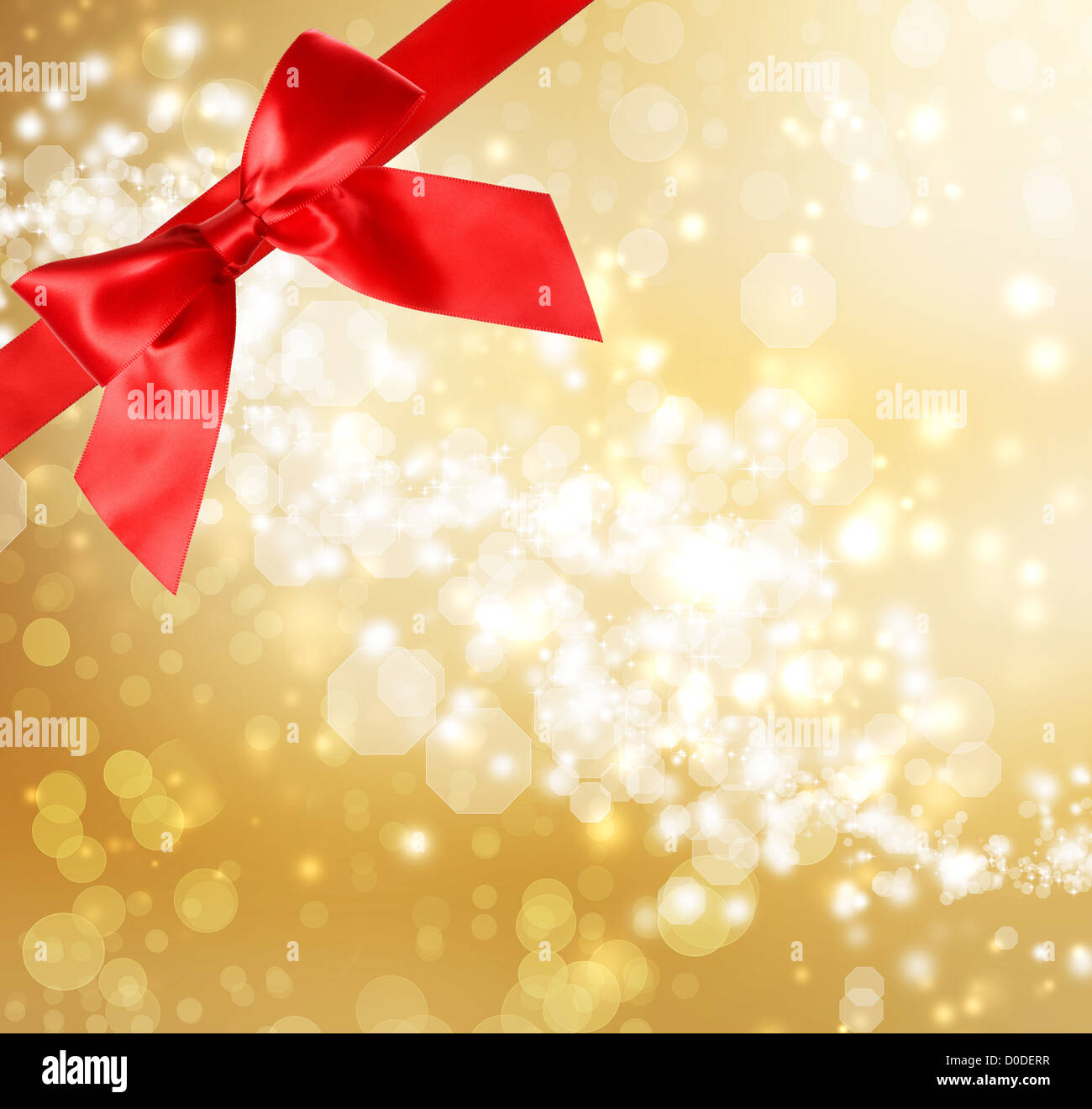 Red Bow and Ribbon with Gold Bokeh Lights Background Stock Photo - Alamy