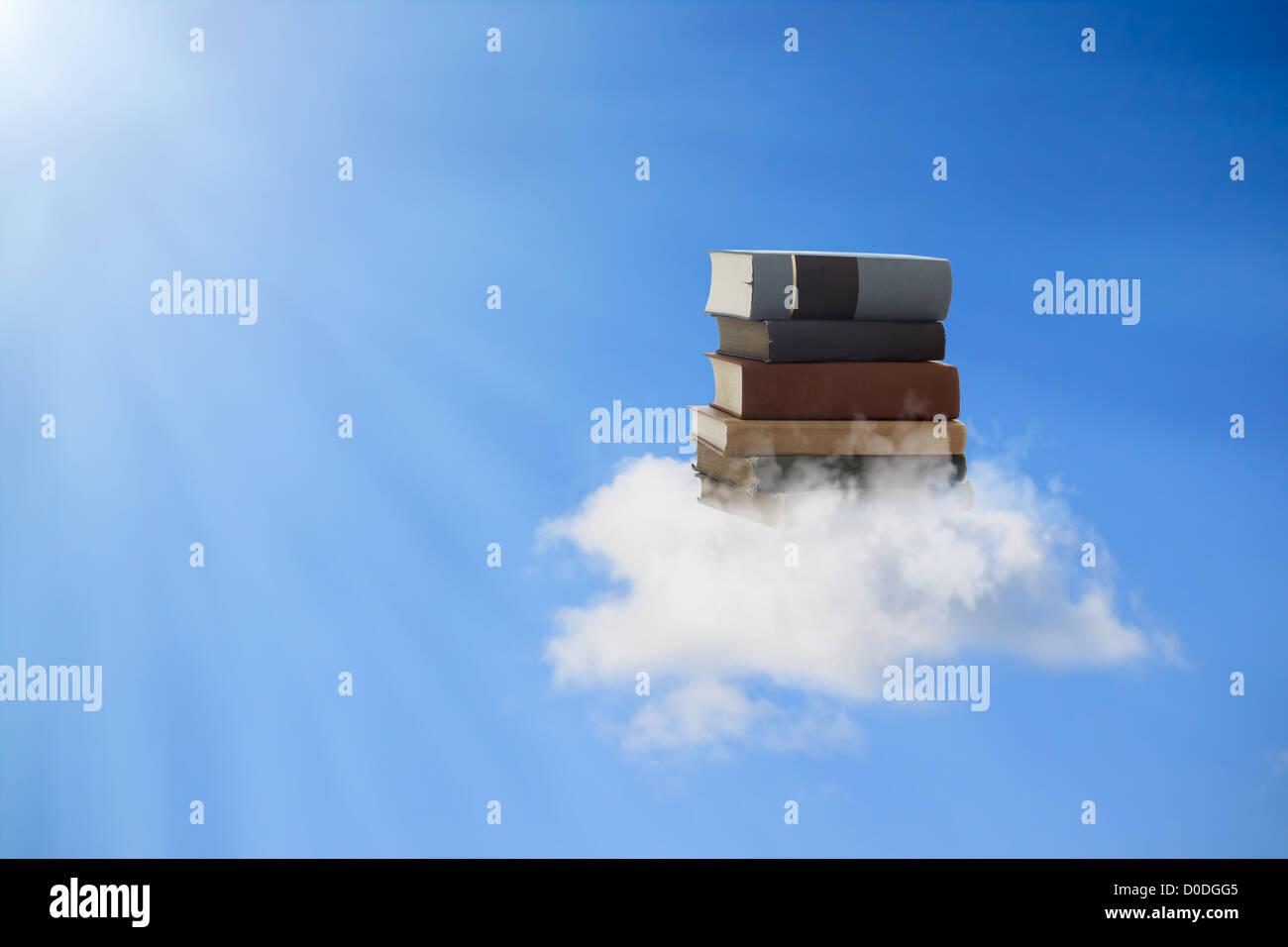 Beautiful books floating on a cloud (concepts of reading, education, knowledge enlightenment) Stock Photo