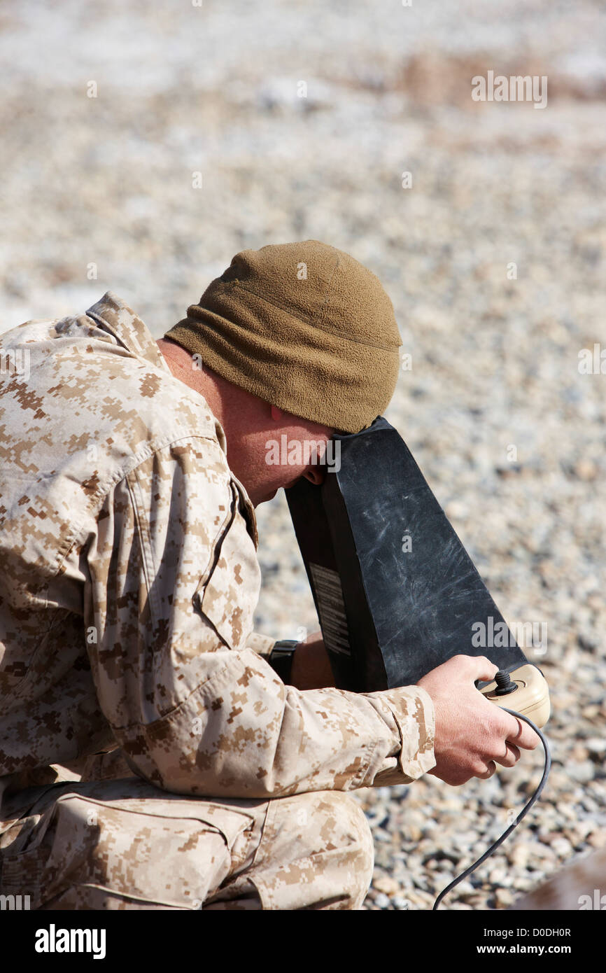 United States Marines assemble Aerovironment RQ-11 Raven-B unmanned aerial vehicle forward operating base in Afghanistan's Stock Photo