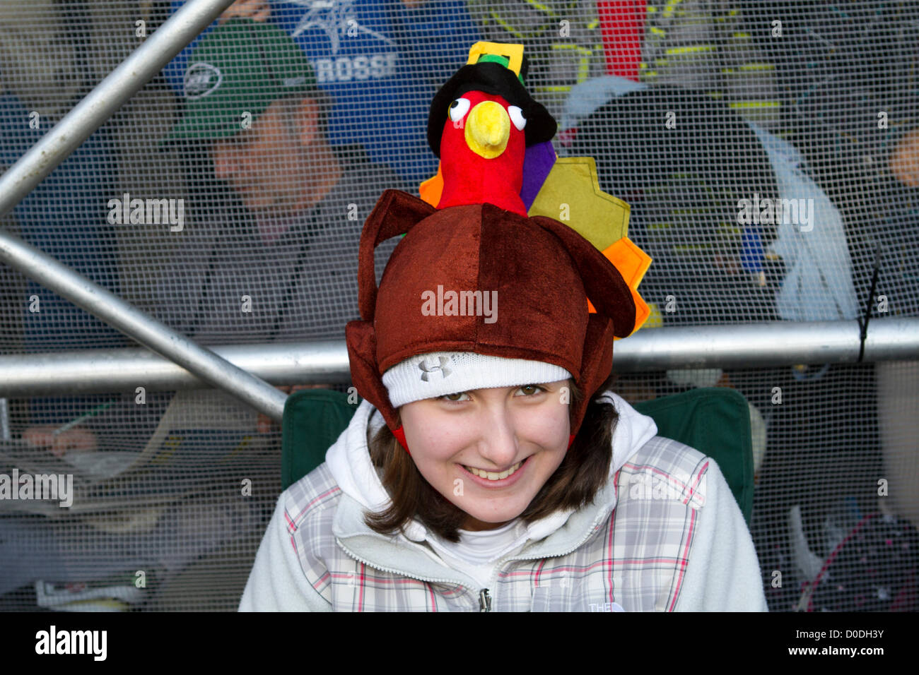 Young spectator wearing turkey hat at Macy's Thanksgiving Day Parade in New York City, on Thursday, Nov. 22, 2012. Stock Photo