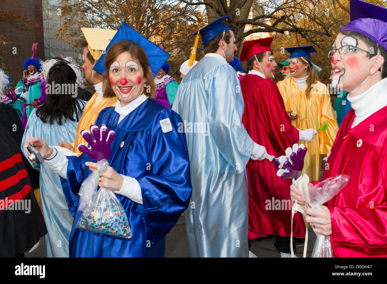 Clowns dressed as students await the start of Macy's Thanksgiving Day Parade in New York City, on Thursday, Nov. 22, 2012. Stock Photo