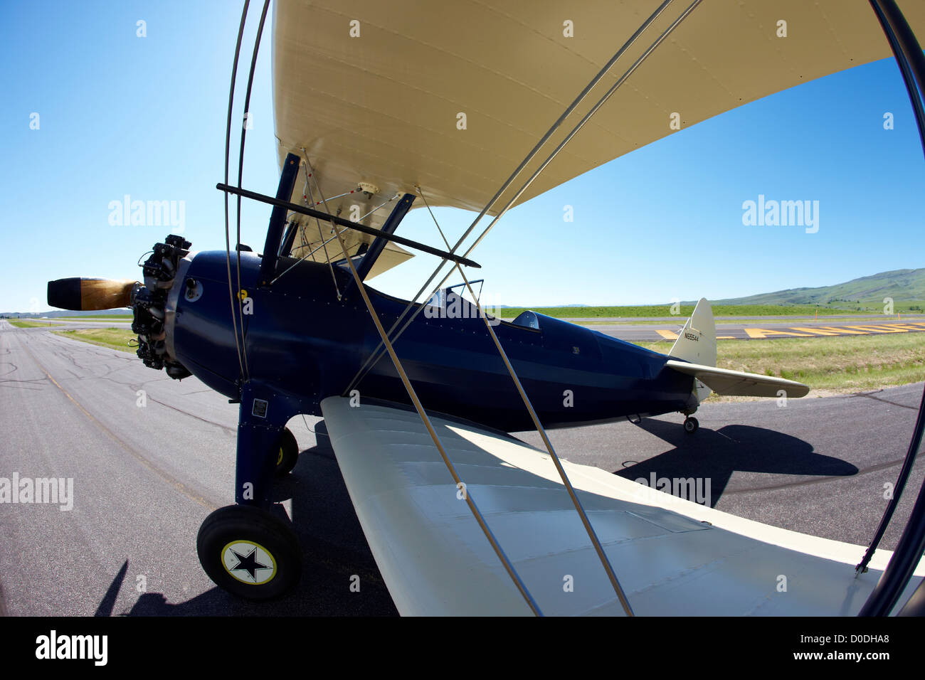 Boeing-Stearman Model 75 Biplane on runway, Lander, Wyoming Stock Photo