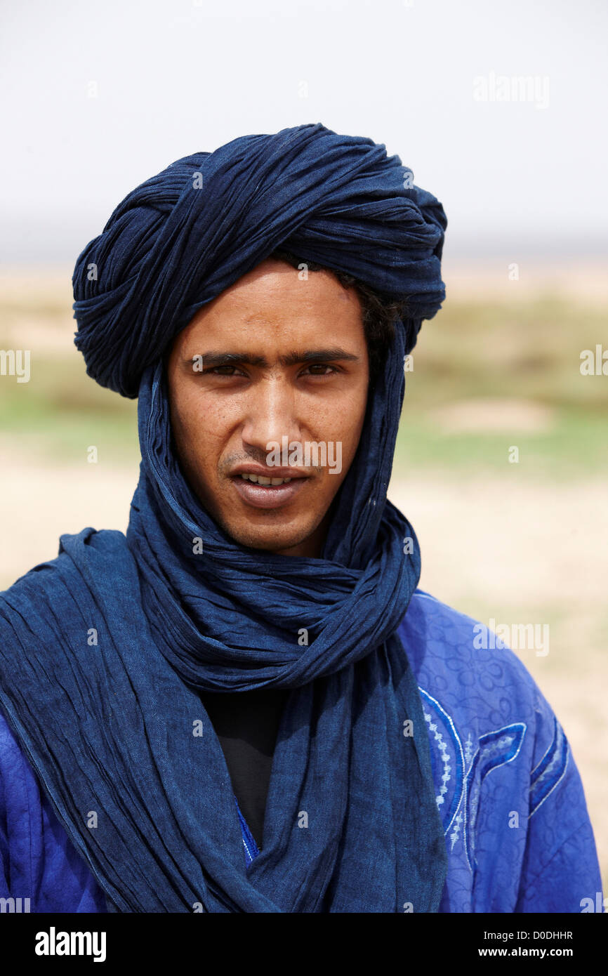 Bedouin nomad in traditional attire, interior Sahara Desert, Morocco