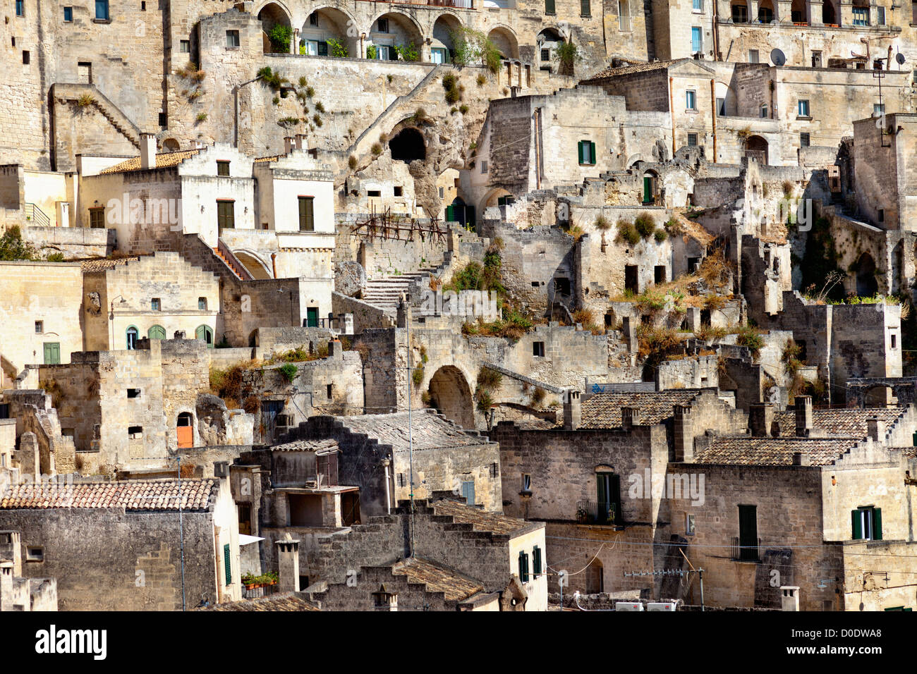 Cityscape view of Sassi di Matera, toward sasso Barisano, during a summer sunny day. UNESCO Stock Photo