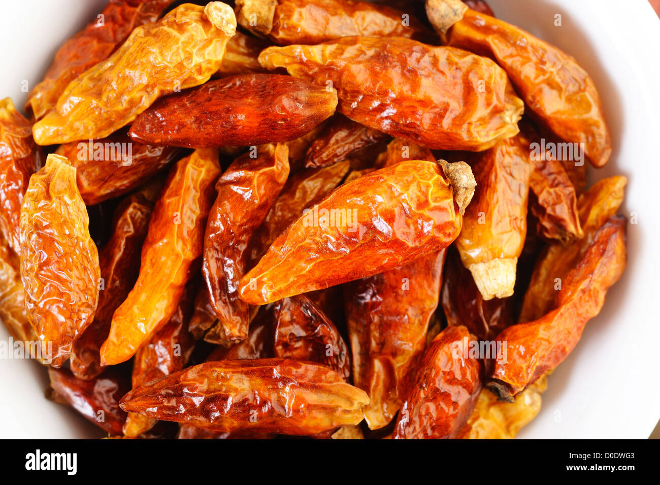 dry red pepper on white dish Stock Photo