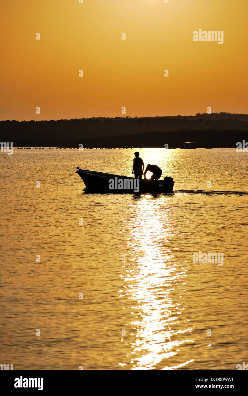 Two men in a boat hi-res stock photography and images - Alamy