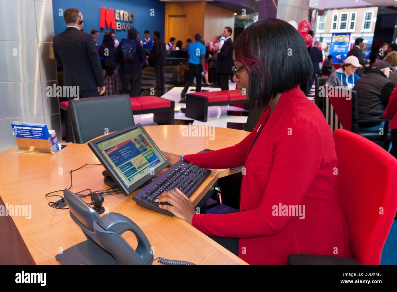 A Customer Service Representative At The Opening Of The New Branch