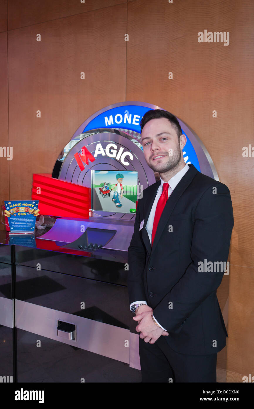 Ben, an employee at the opening of the new branch of Metro Bank in Reading, Berkshire on