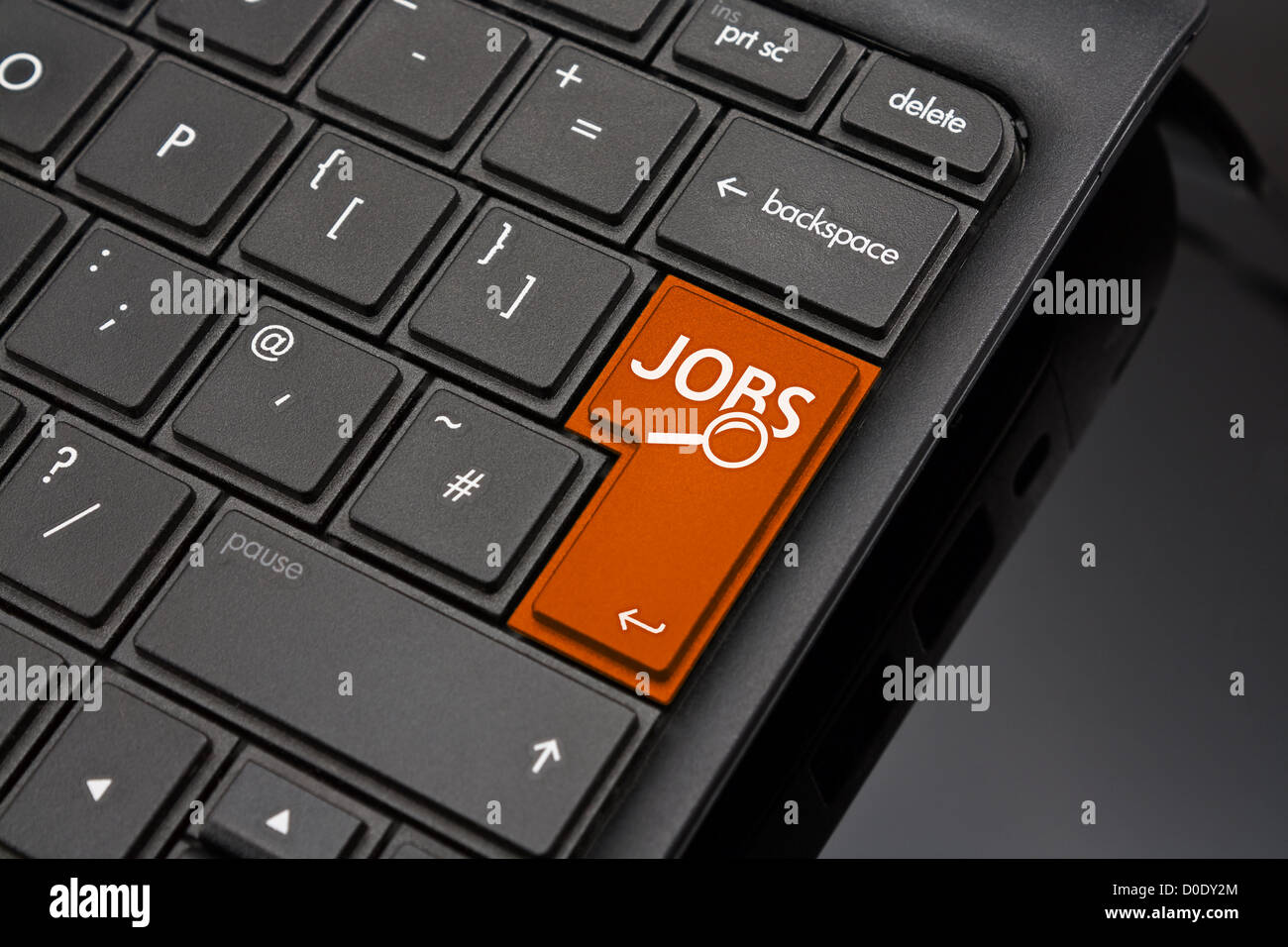 Job search Return Key symbolizing the searching of internet recruitment websites to find work or a job by an applicant Stock Photo