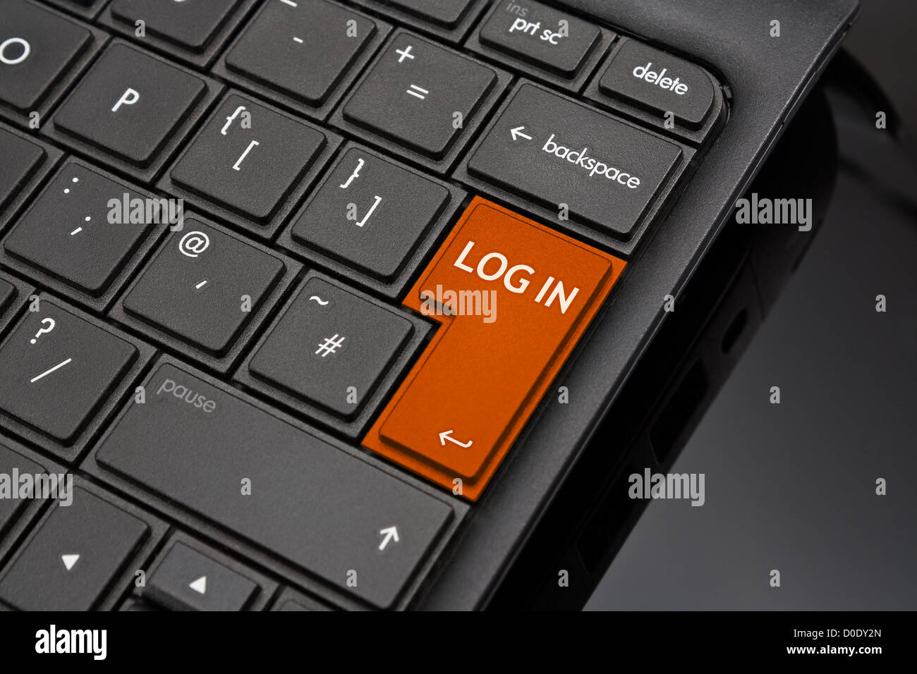 Log in Return Key symbolizing the logging in to an account online after entering username and password Stock Photo