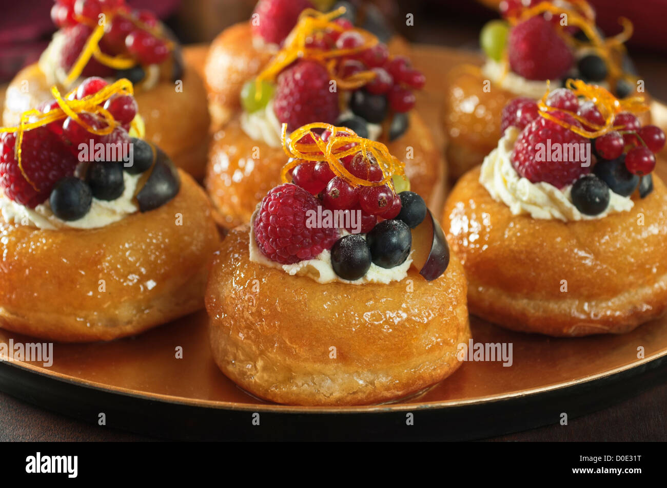 Rum babas Small savarins Dessert Stock Photo Alamy