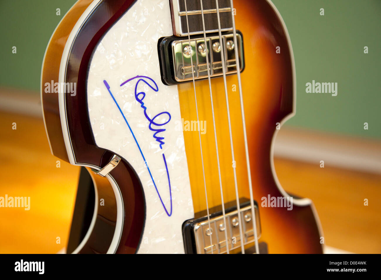 London, UK. Friday 23rd November 2012. Christies auction house showcasing memorabilia from every decade of the past century of popular culture from the industries of film and music. Hofner 500/1 violin bass guitar signed by Paul McCartney. Stock Photo