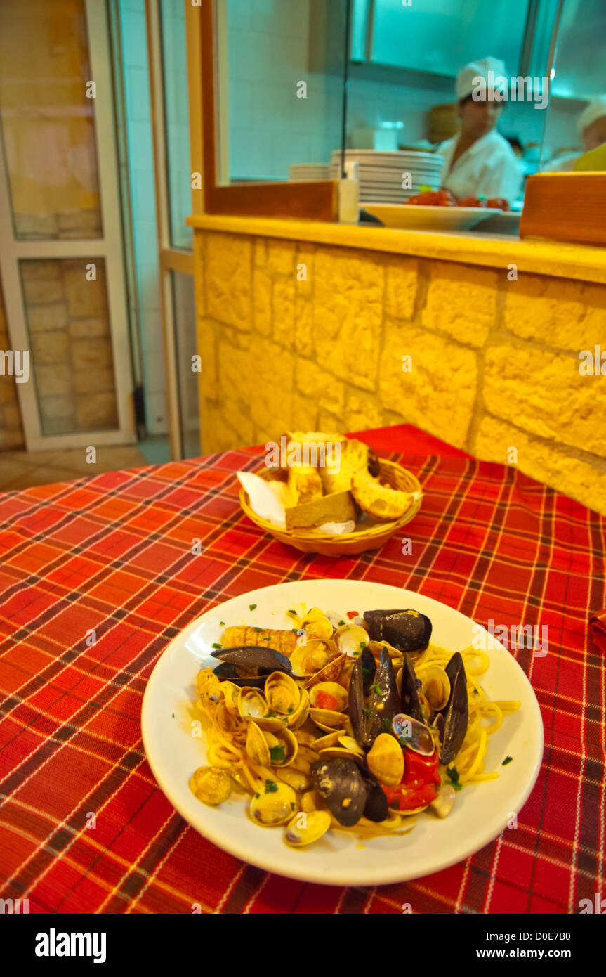 Spaghetti Frutti di Mare the seafood spaghetti dish Trattoria Campagnola restaurant centro storico old town Naples Italy Stock Photo