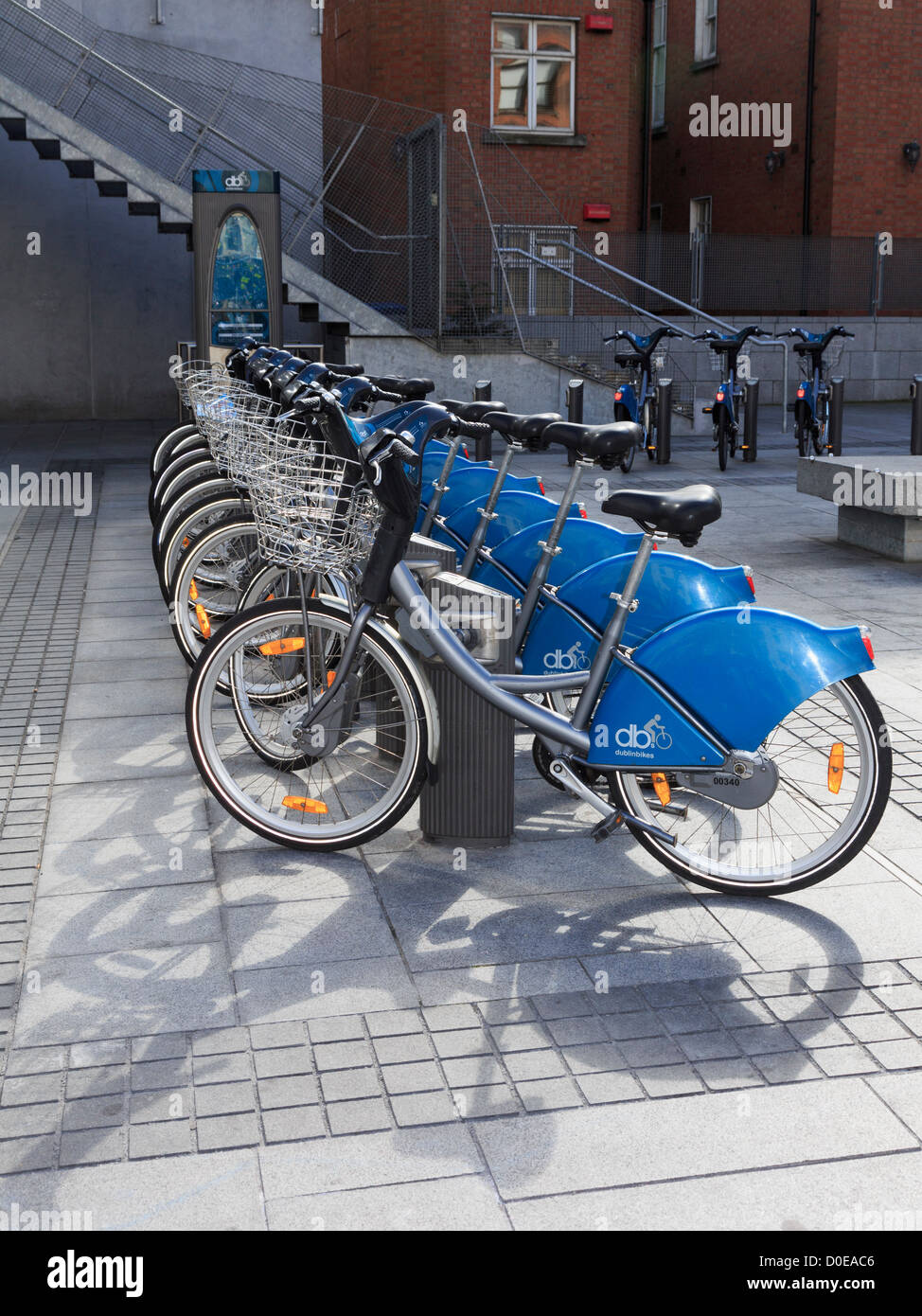 Dublinbikes public rental bikes parked up on stands in city cycling scheme station in Dublin city, Southern Ireland, Eire Stock Photo