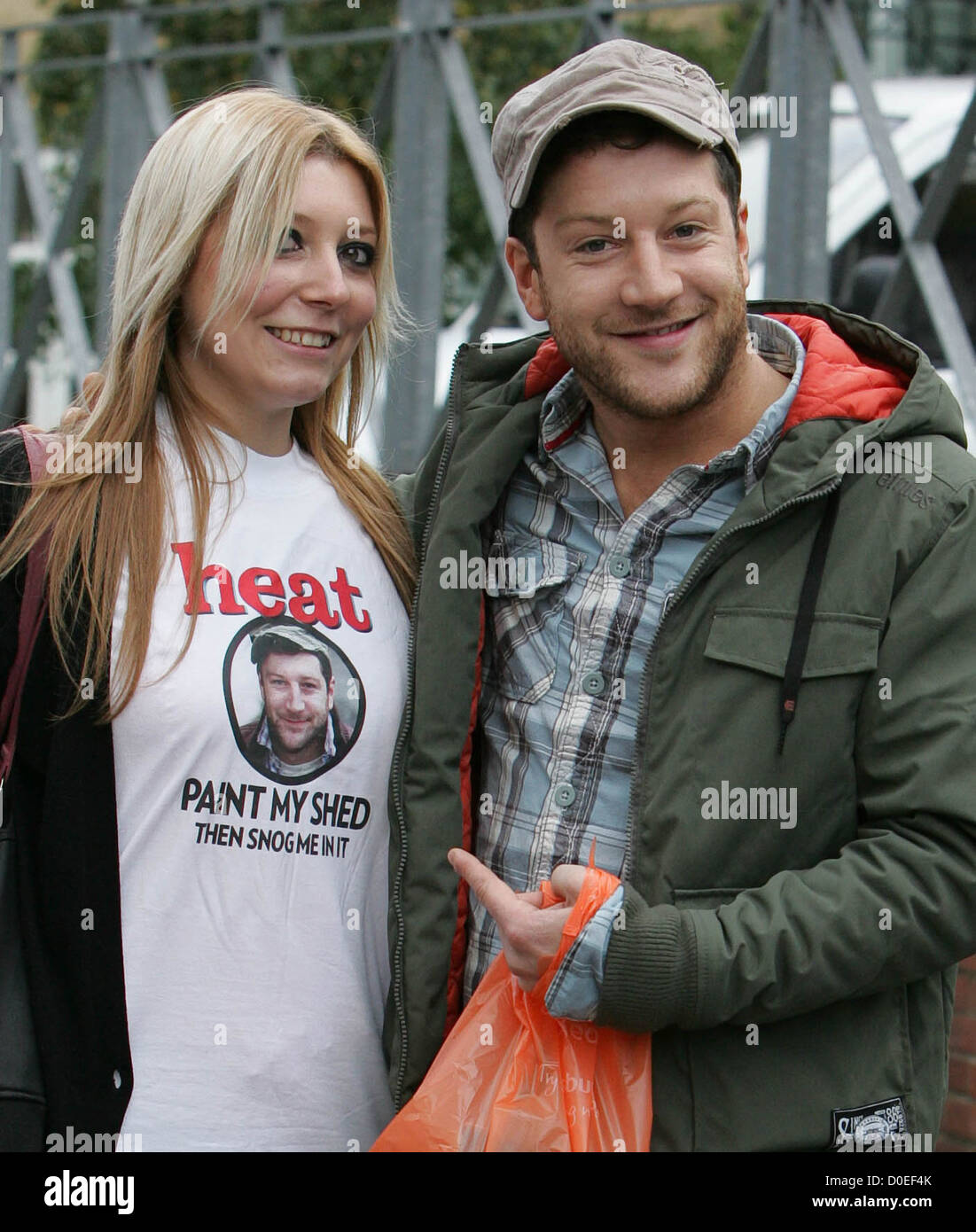 The X Factor finalist Matt Cardle is approach by a fan wearing a