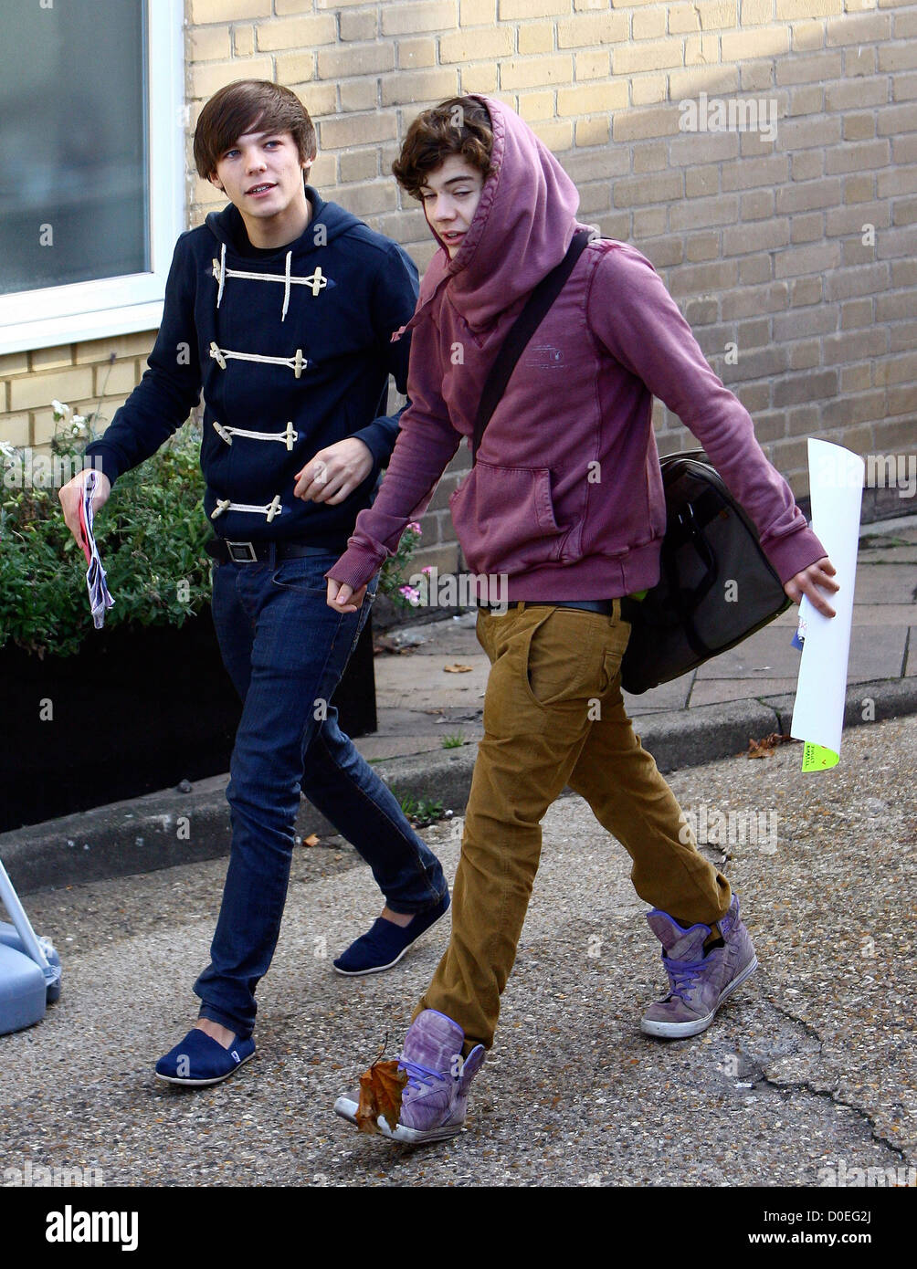 Louis Tomlinson and Harry Styles of One Direction arrive at 'The X Factor'  studios London, England - 07.11.10 Stock Photo - Alamy