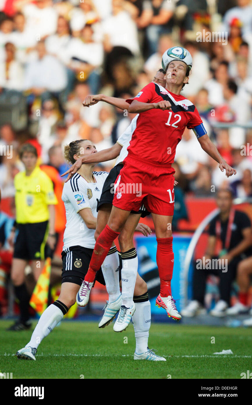 Christine Sinclair of Canada (12) jumps for a header during the opening match of the FIFA Women's World Cup against Germany. Stock Photo