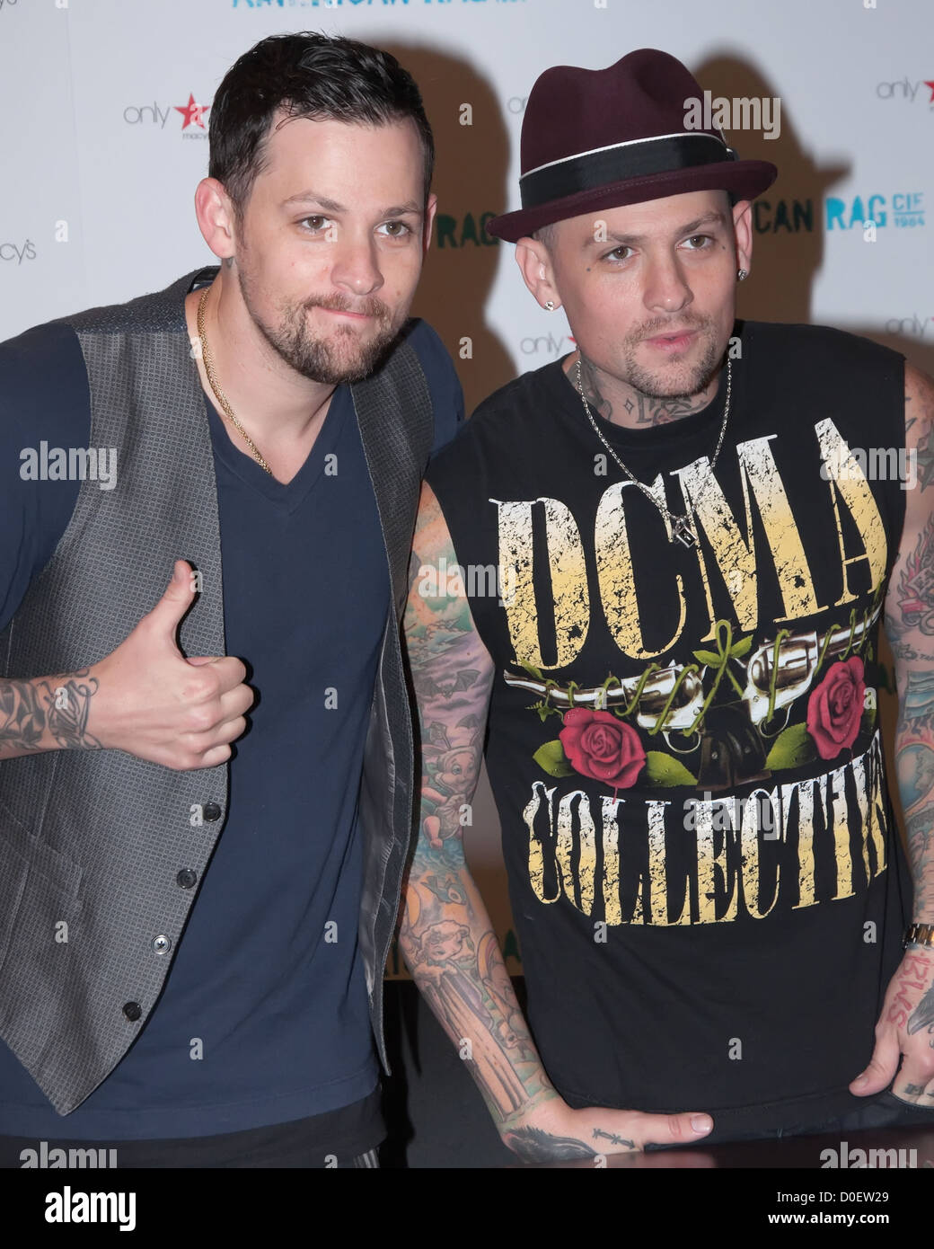 Joel Madden, Benji Madden Benji and Joel Madden of Good Charlotte perform at the Cherry Hill Macy's to promote their clothing Stock Photo