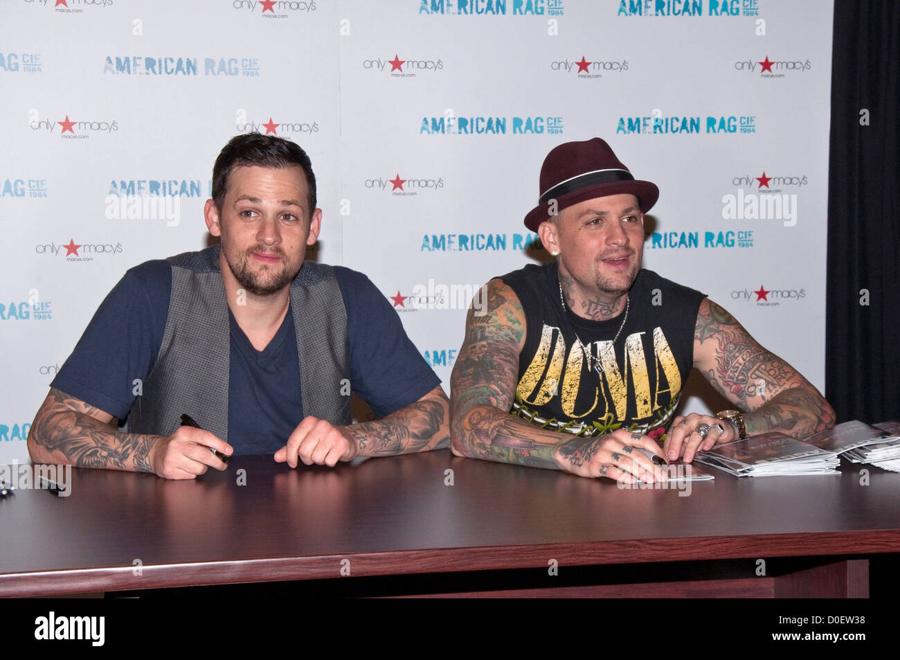 Joel Madden Benji Madden Benji and Joel Madden of Good Charlotte sign autographs after their performance at Macy's. Cherry Stock Photo
