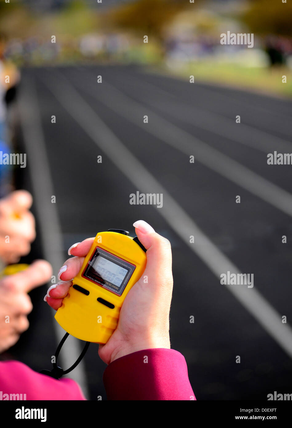Stopwatch for running a race around a track with lines Stock Photo Alamy