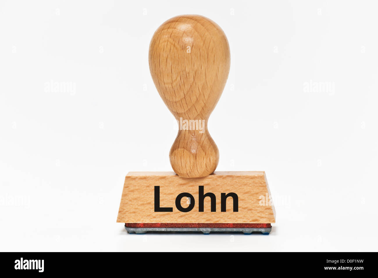 One Stamp with the German inscription Lohn (Wages) upright, background white. Stock Photo