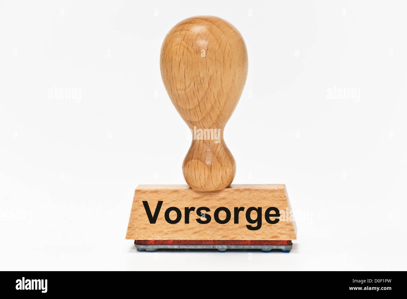 One Stamp with the German inscription Vorsorge (Precaution) upright, background white. Stock Photo