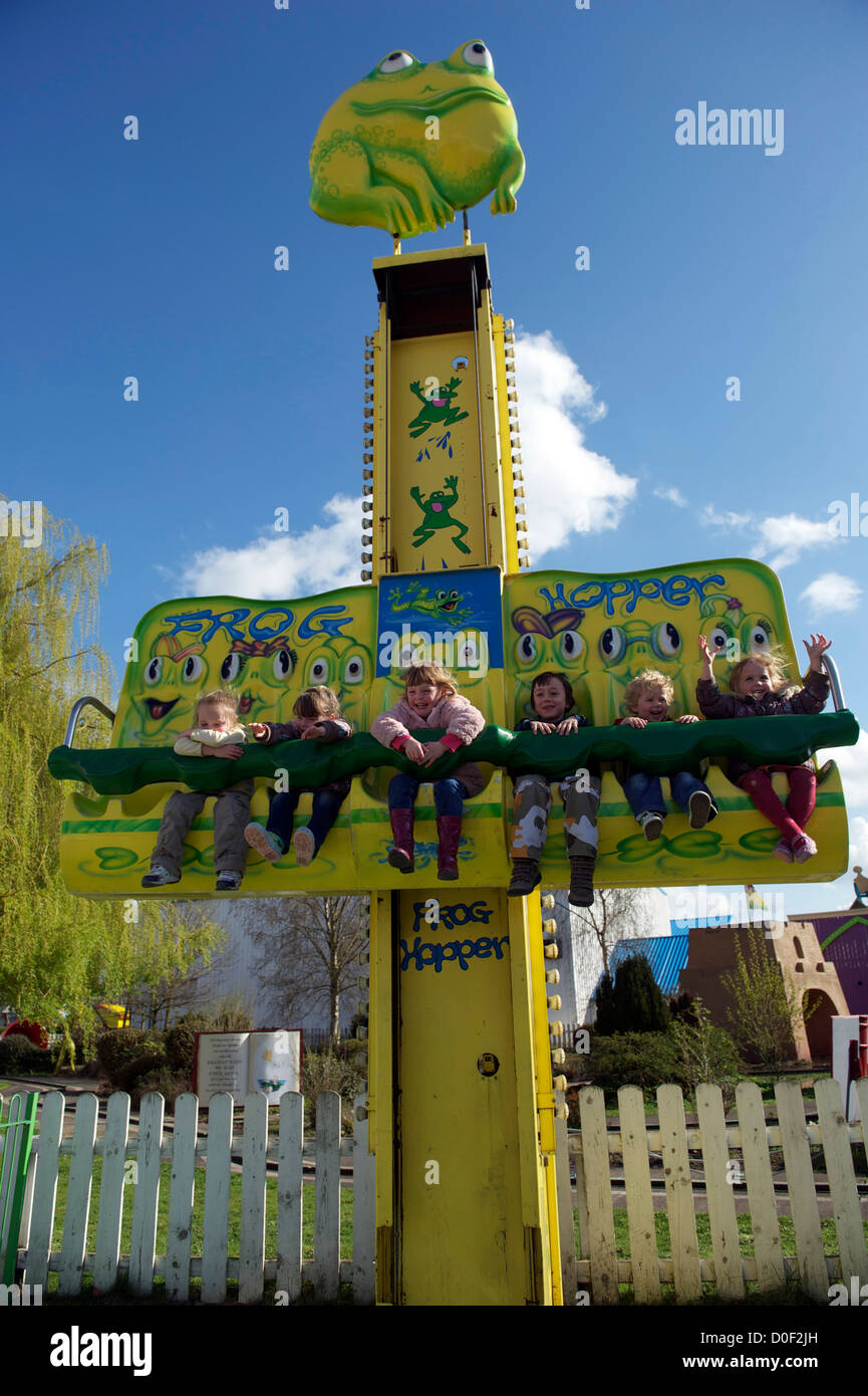 Children riding on a fairground ride at Flamingo land resort in North