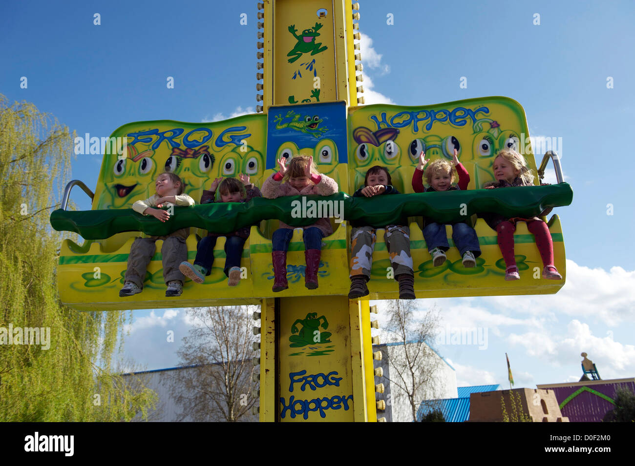 Children riding on a fairground ride at Flamingo land resort in North