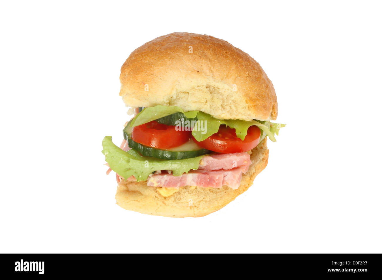 Ham salad in a crusty bread roll isolated against white Stock Photo