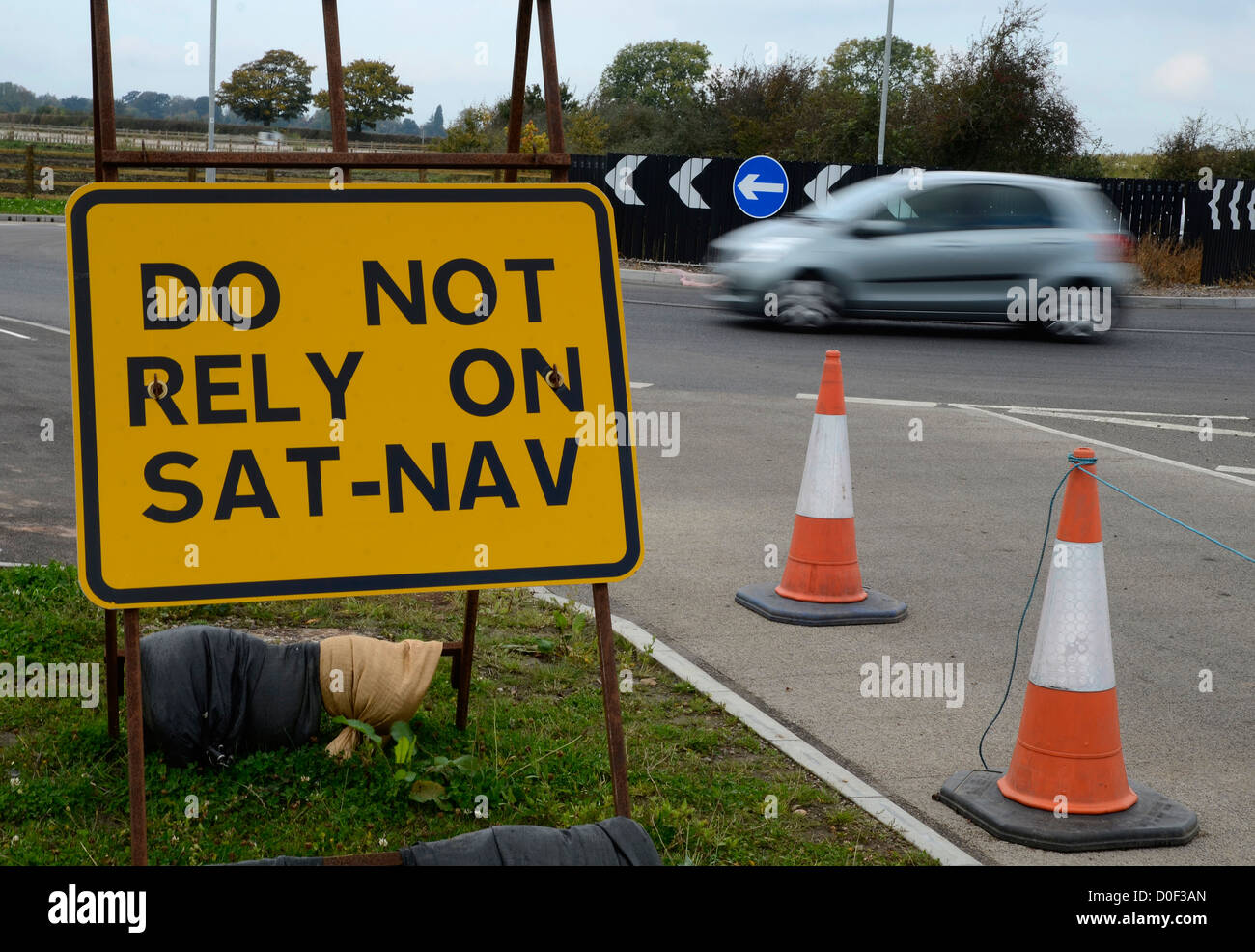 A road sign advising not to rely on sat nav devices Stock Photo