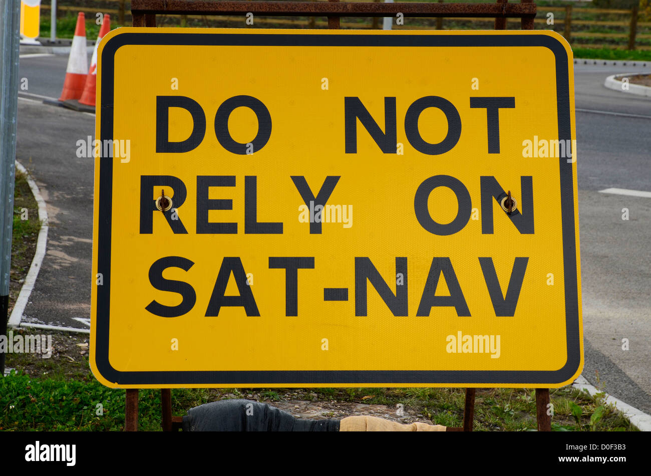 A road sign advising not to rely on sat nav devices Stock Photo
