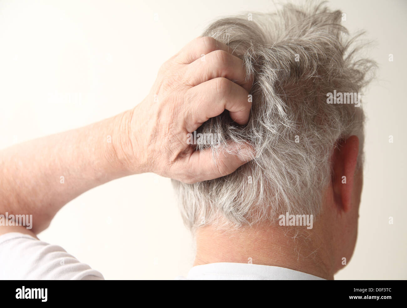 Man with hand on head hi-res stock photography and images - Alamy
