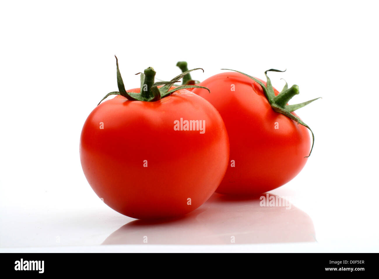 tomatos isolated on white background close up Stock Photo - Alamy