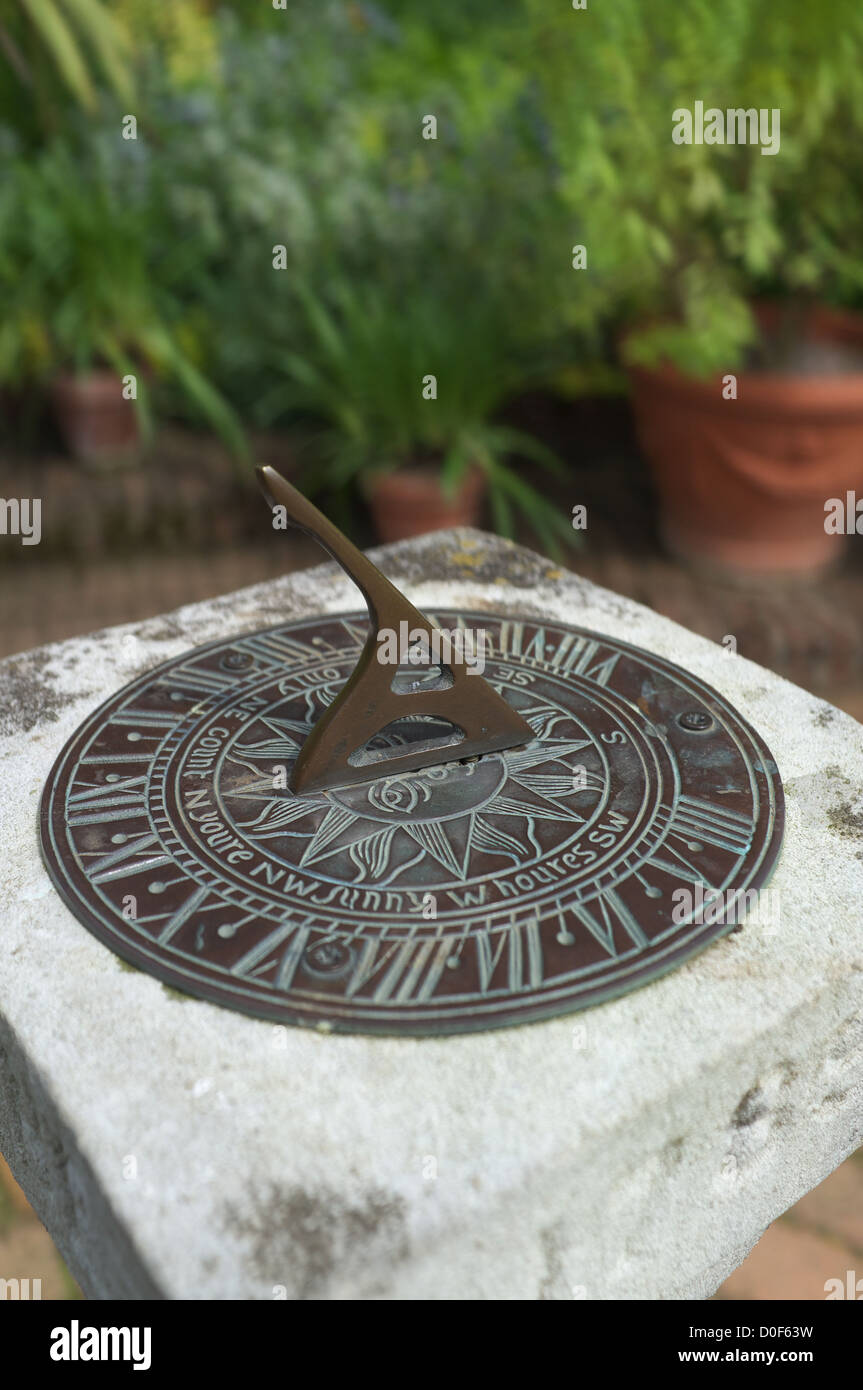 Garden Sundial on stone plinth, England, UK Stock Photo Alamy
