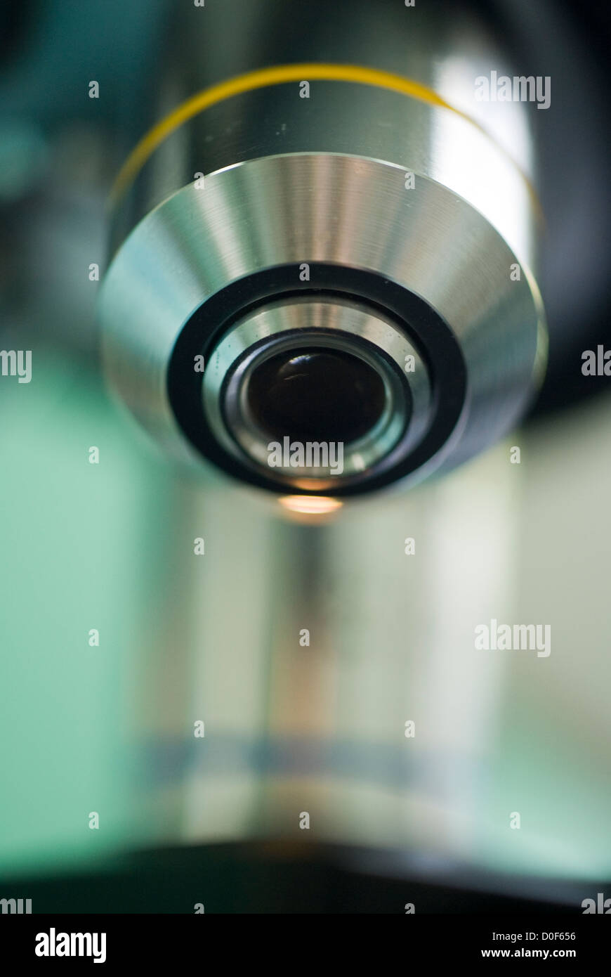Macro shoot of microscope lens with yellow strip shallow dof Stock Photo
