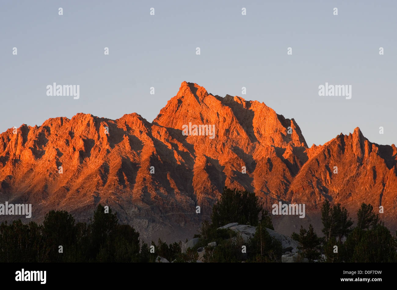 Mount Humphreys sunset with orange alpenglow from the Humphreys Basin in the Sierra Nevada mountains Stock Photo