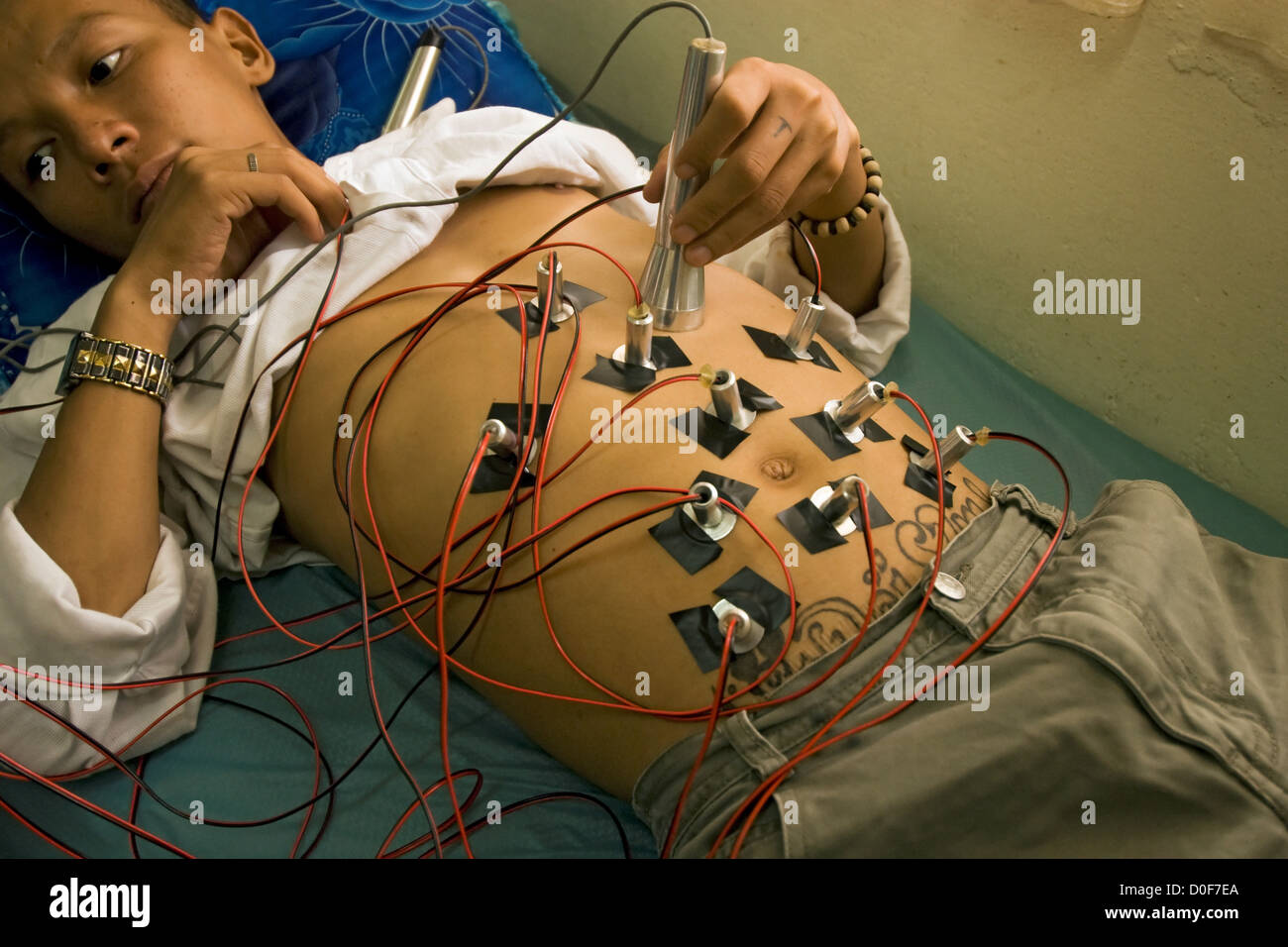 Laser Acupuncture Mai Khoi Clinic In Ho Chi Minh City Which Is Underwritten Catholic Church. Clinic Works Aids Patients Stock Photo - Alamy