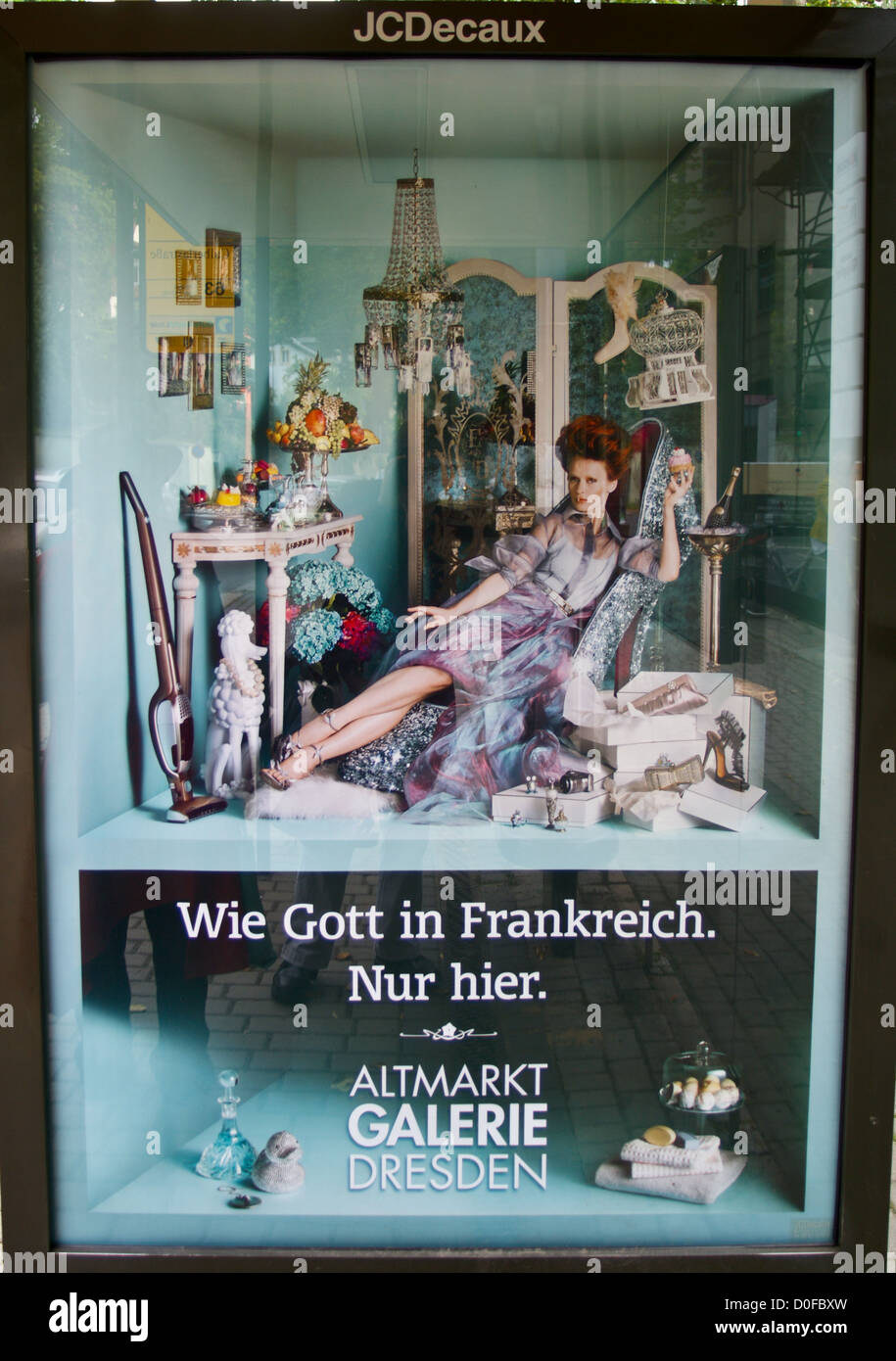 A poster advertising Galerie shopping centre in a bus stop, Dresden, Sachsen, Saxony, Germany Stock Photo