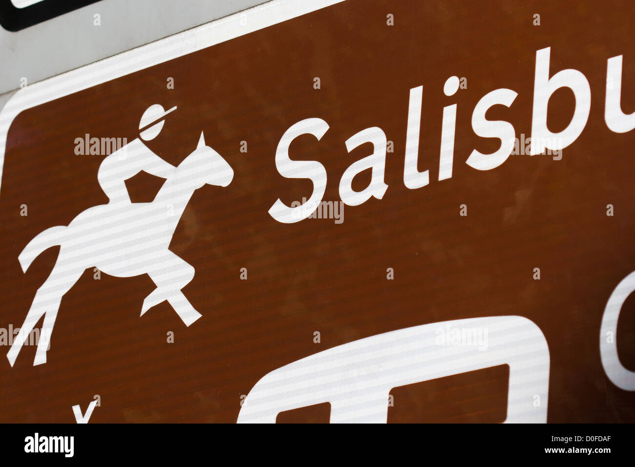 Road sign approaching pointing to Salisbury racecourse Wiltshire Stock Photo