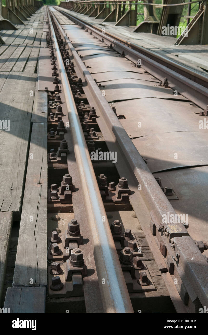 Old rusty railway track. Railway bridge in Wadowice, Poland. Stock Photo