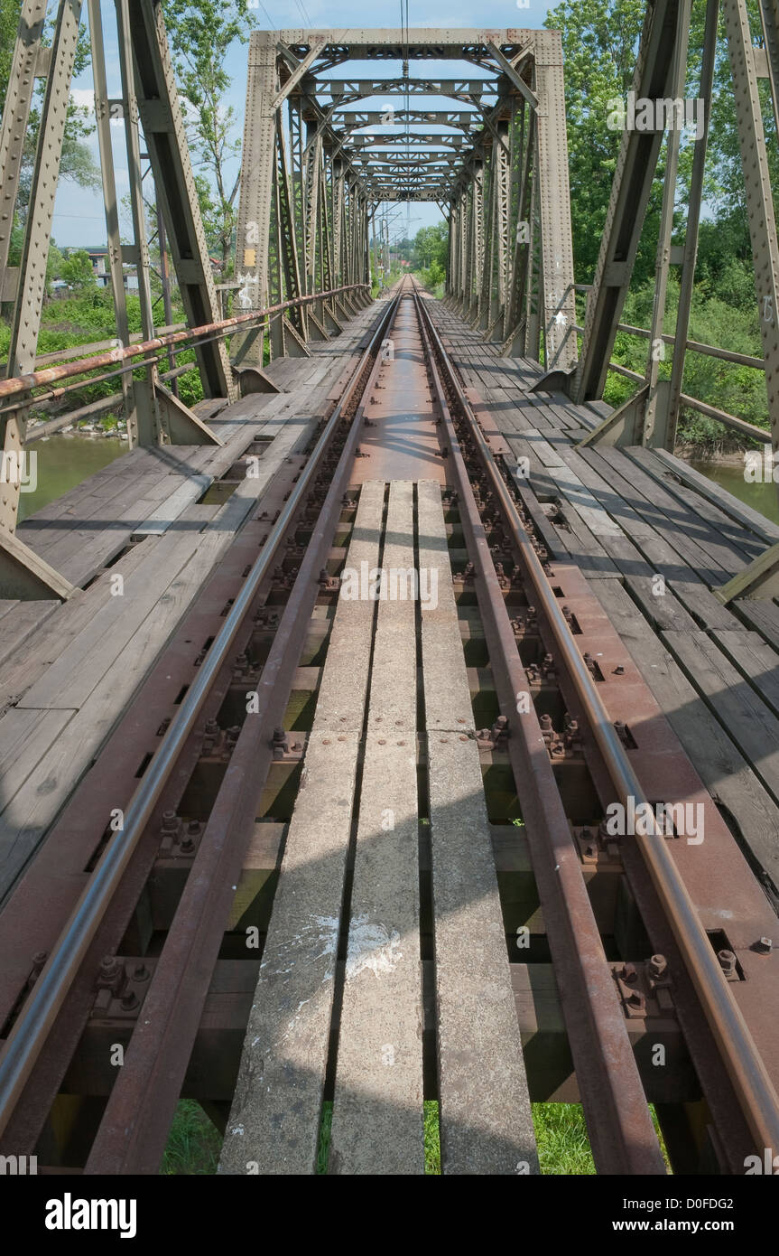 Old rusty railway track. Railway bridge in Wadowice, Poland. Stock Photo