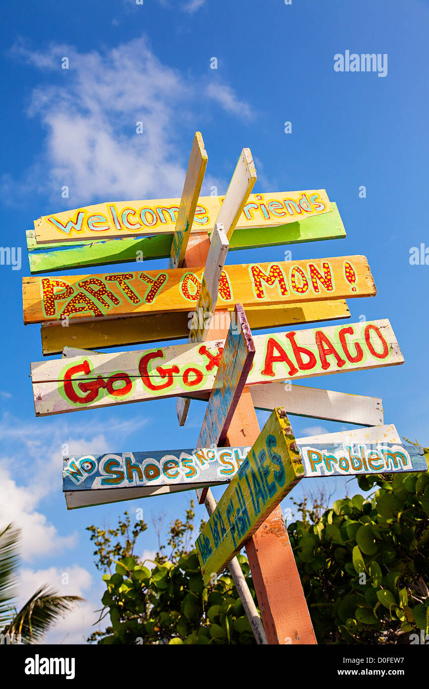 Humorous directional sign in New Plymouth on Green Turtle Cay, Bahamas. Stock Photo