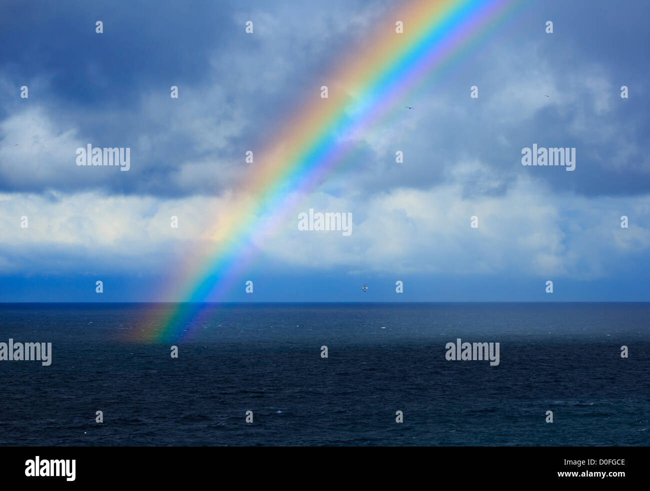 Rainbow over the Atlantic Ocean Stock Photo