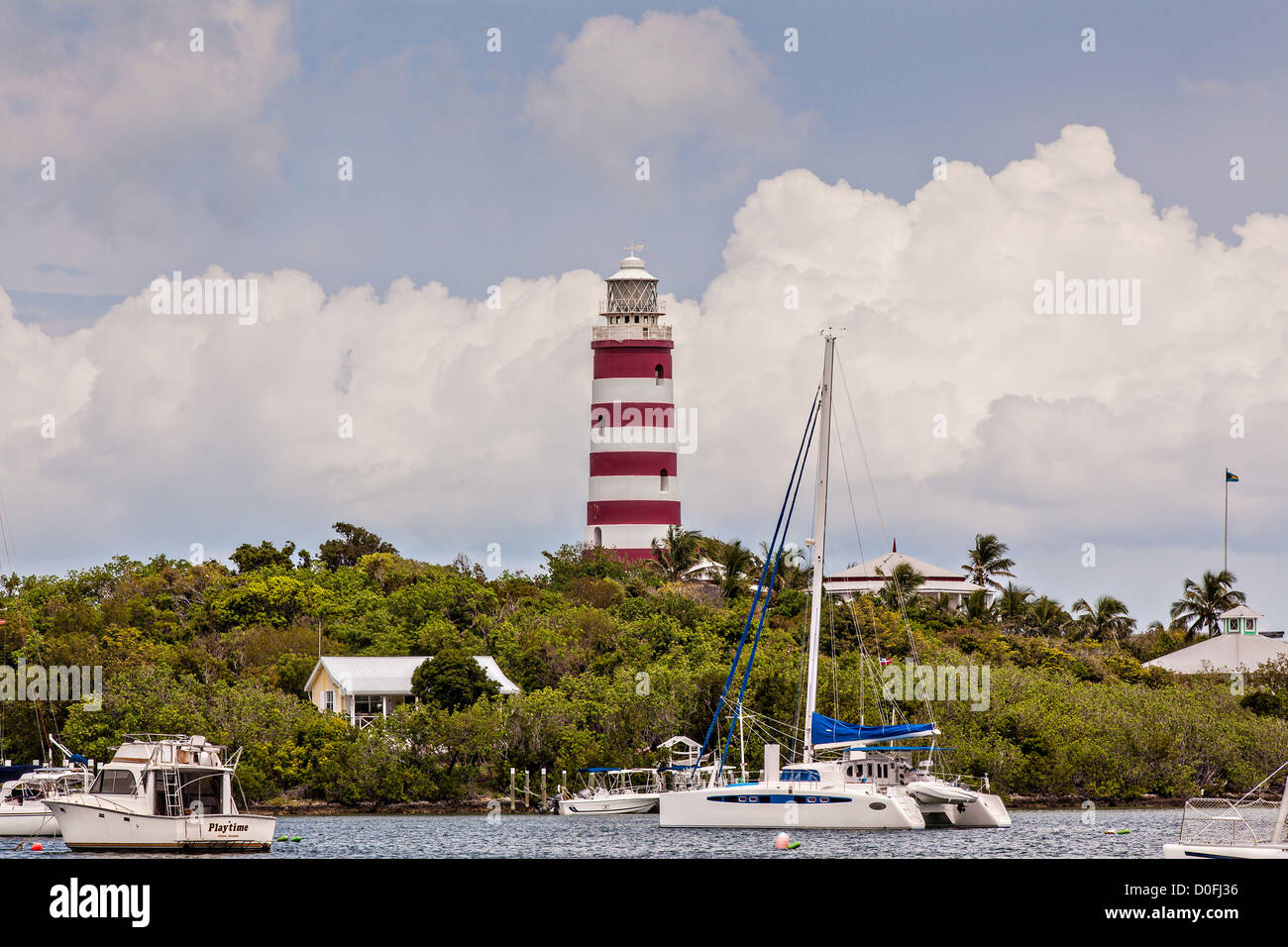Hope Town lighthouse and harbor Elbow Cay Abacos, Bahamas Stock Photo